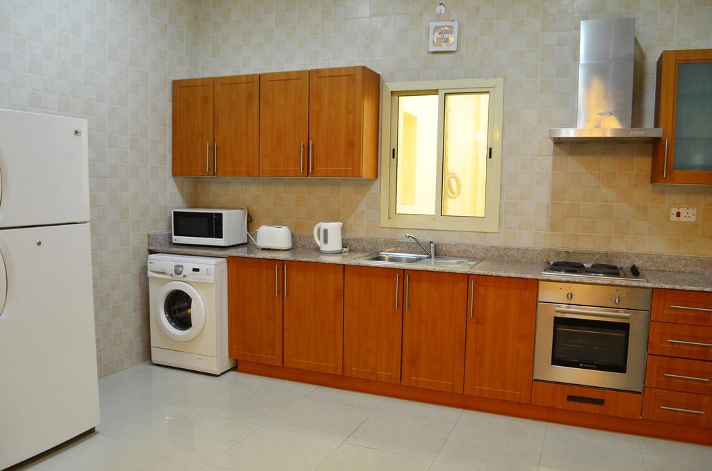 President Suites Apartments Manama Exterior photo
